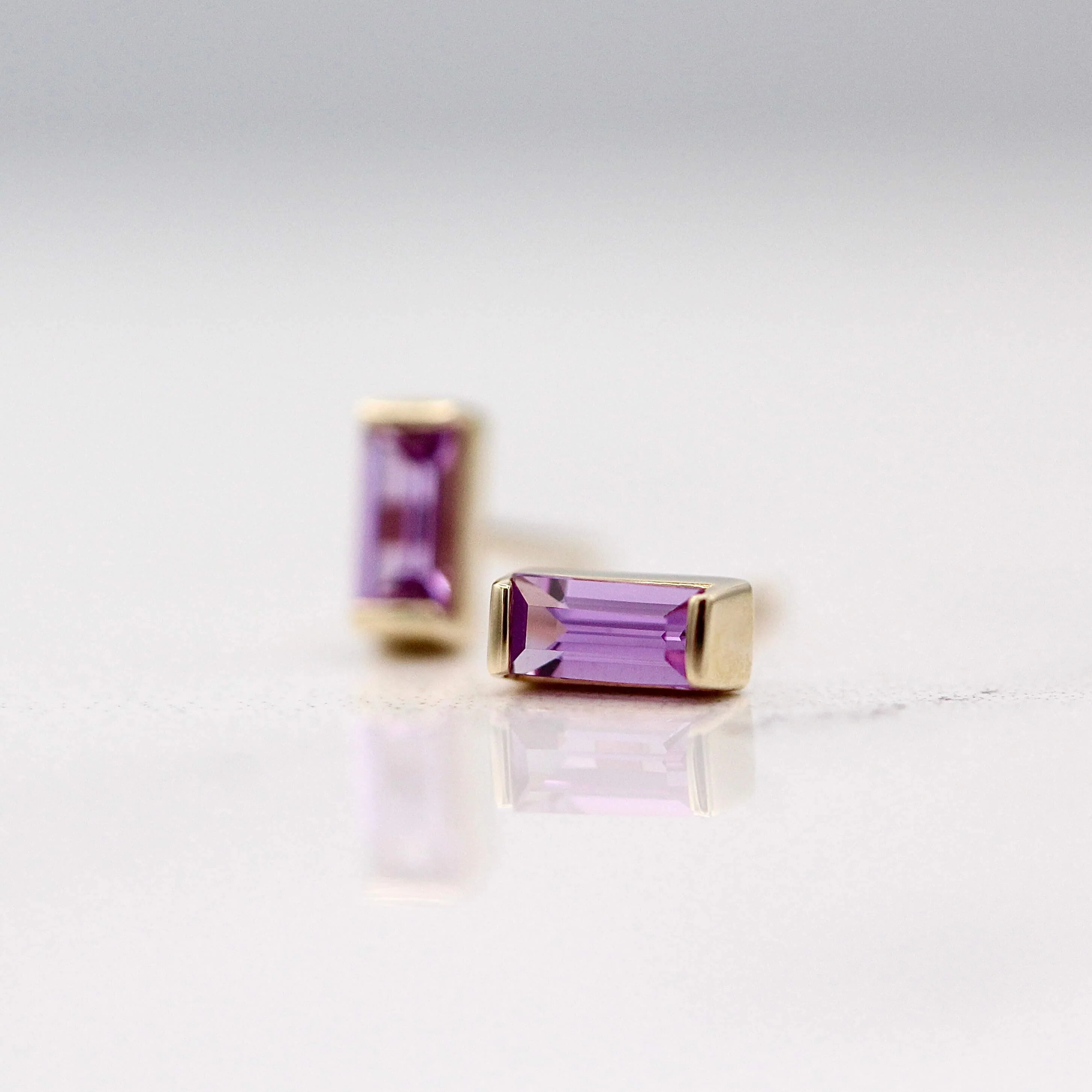 The February Baguette Birthstone Earrings with Purple Sapphire in Yellow Gold - Image 3
