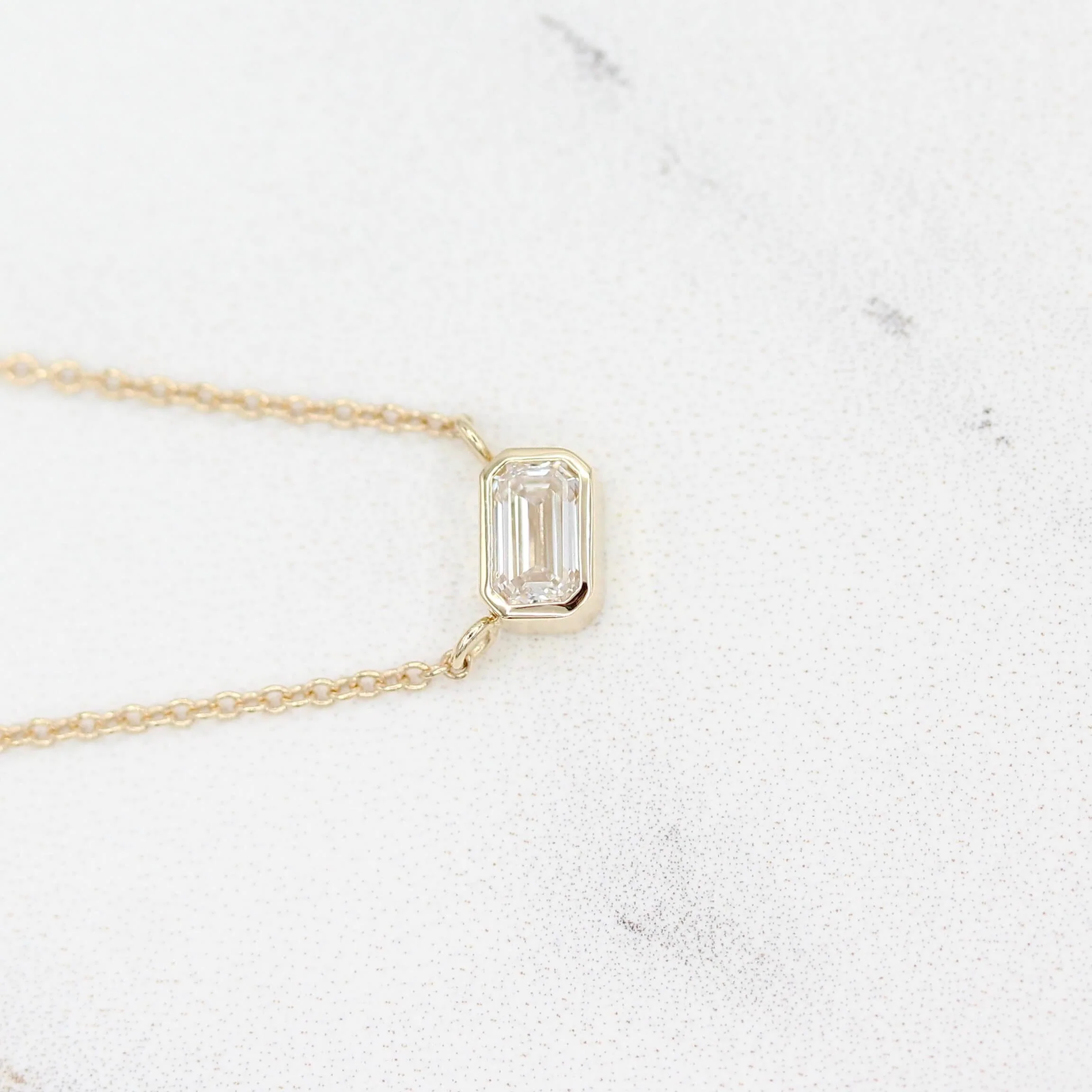 The East-West Emerald Bezel Necklace in Yellow Gold - Image 3