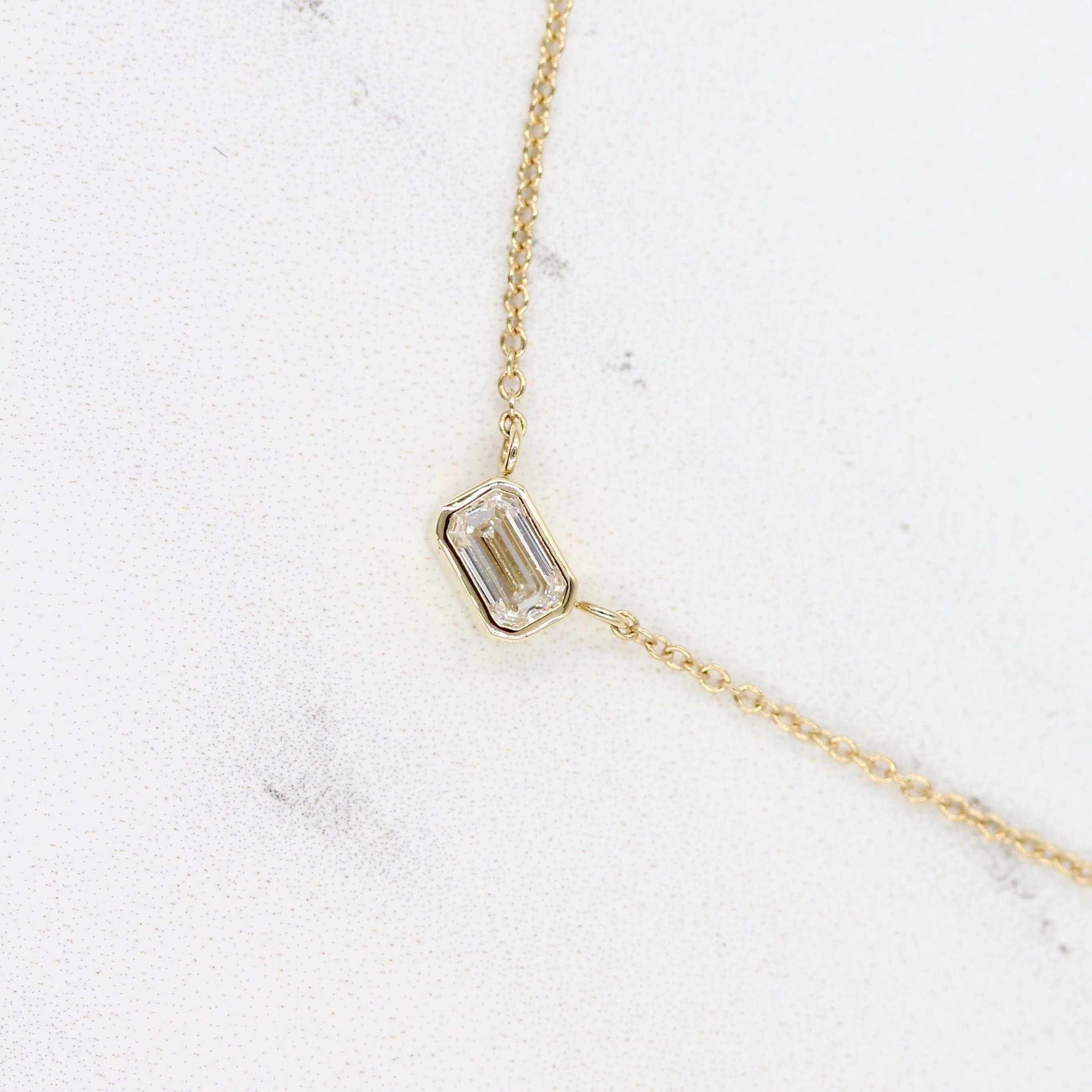The East-West Emerald Bezel Necklace in Yellow Gold - Image 9
