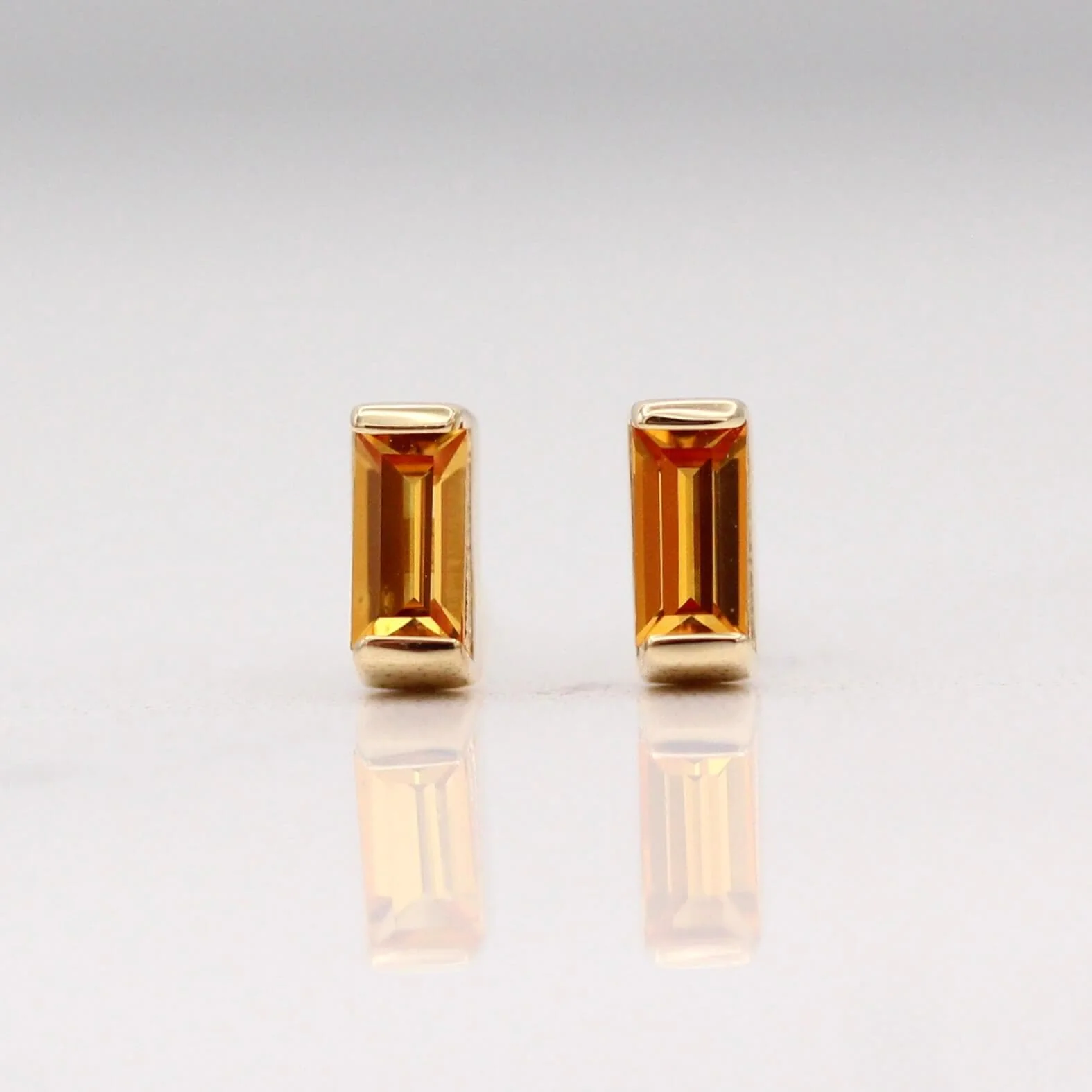The November Baguette Birthstone Earrings with Gold Sapphire in Yellow Gold