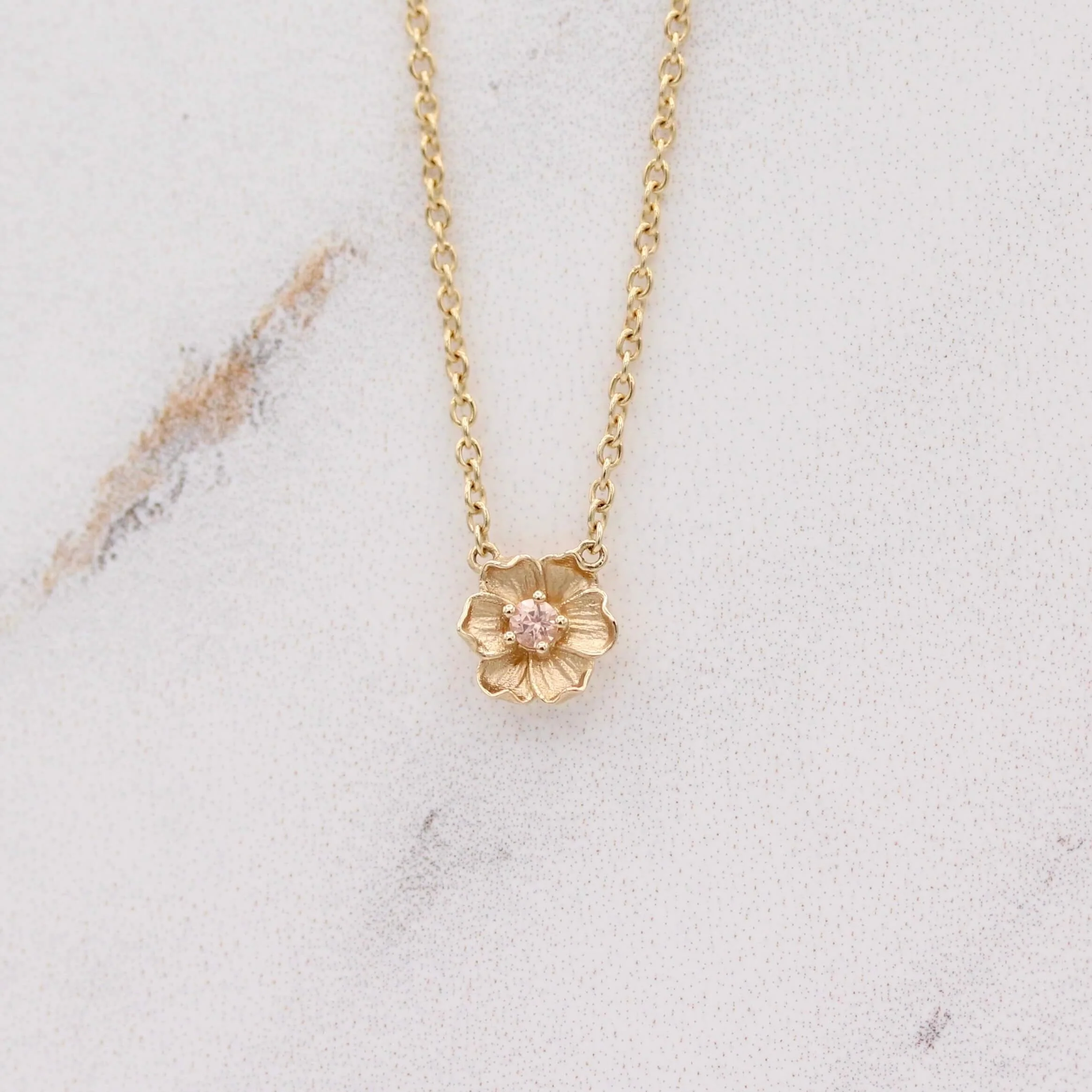 The October Poppy Birthstone Necklace with Peachy-Pink Sapphire in Yellow Gold